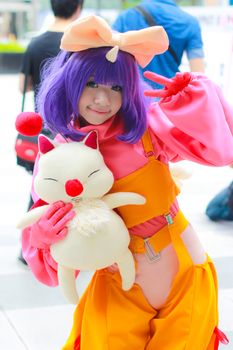 Bangkok - Aug 31: An unidentified Japanese anime cosplay pose  on August 31, 2014 at Central World, Bangkok, Thailand.