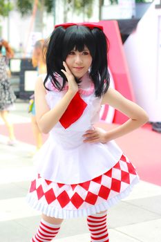 Bangkok - Aug 31: An unidentified Japanese anime cosplay pose  on August 31, 2014 at Central World, Bangkok, Thailand.