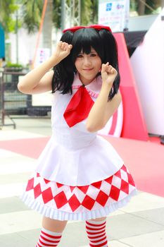 Bangkok - Aug 31: An unidentified Japanese anime cosplay pose  on August 31, 2014 at Central World, Bangkok, Thailand.