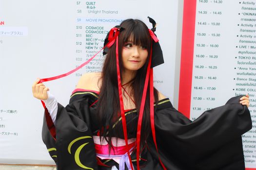 Bangkok - Aug 31: An unidentified Japanese anime cosplay pose  on August 31, 2014 at Central World, Bangkok, Thailand.