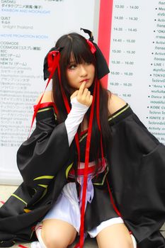 Bangkok - Aug 31: An unidentified Japanese anime cosplay pose  on August 31, 2014 at Central World, Bangkok, Thailand.