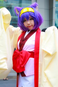 Bangkok - Aug 31: An unidentified Japanese anime cosplay hatsuse izuna pose  on August 31, 2014 at Central World, Bangkok, Thailand.