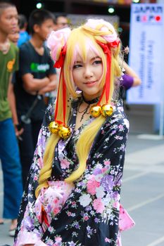 Bangkok - Aug 31: An unidentified Japanese anime cosplay pose  on August 31, 2014 at Central World, Bangkok, Thailand.