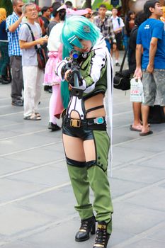 Bangkok - Aug 31: An unidentified Japanese anime cosplay Sinon pose  on August 31, 2014 at Central World, Bangkok, Thailand.