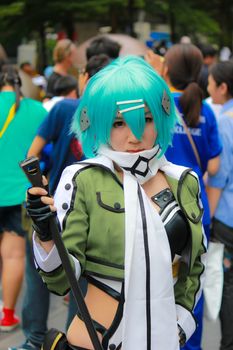 Bangkok - Aug 31: An unidentified Japanese anime cosplay Sinon pose  on August 31, 2014 at Central World, Bangkok, Thailand.