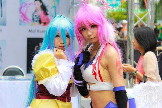 Bangkok - Aug 31: An unidentified Japanese anime cosplay Shiro and Jibril pose  on August 31, 2014 at Central World, Bangkok, Thailand.