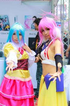 Bangkok - Aug 31: An unidentified Japanese anime cosplay Shiro and Jibril pose  on August 31, 2014 at Central World, Bangkok, Thailand.