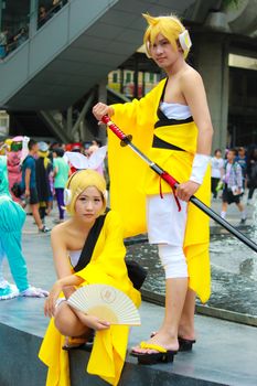 Bangkok - Aug 31: An unidentified Japanese anime cosplay Rin and Len pose  on August 31, 2014 at Central World, Bangkok, Thailand.