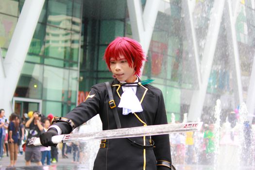 Bangkok - Aug 31: An unidentified Japanese anime cosplay pose  on August 31, 2014 at Central World, Bangkok, Thailand.