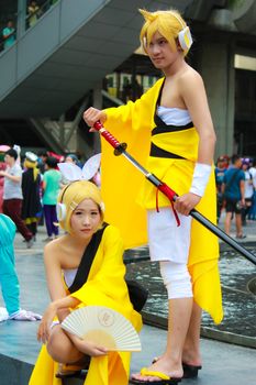 Bangkok - Aug 31: An unidentified Japanese anime cosplay Rin and Len pose  on August 31, 2014 at Central World, Bangkok, Thailand.