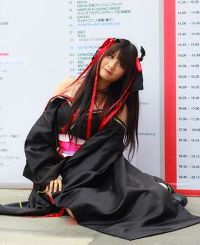 Bangkok - Aug 31: An unidentified Japanese anime cosplay pose  on August 31, 2014 at Central World, Bangkok, Thailand.