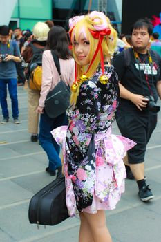 Bangkok - Aug 31: An unidentified Japanese anime cosplay pose  on August 31, 2014 at Central World, Bangkok, Thailand.