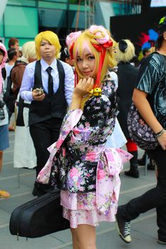 Bangkok - Aug 31: An unidentified Japanese anime cosplay pose  on August 31, 2014 at Central World, Bangkok, Thailand.