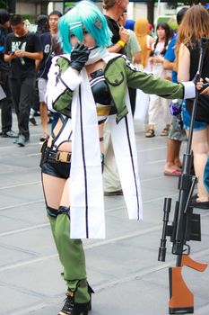 Bangkok - Aug 31: An unidentified Japanese anime cosplay Sinon pose  on August 31, 2014 at Central World, Bangkok, Thailand.