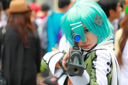 Bangkok - Aug 31: An unidentified Japanese anime cosplay Sinon pose  on August 31, 2014 at Central World, Bangkok, Thailand.