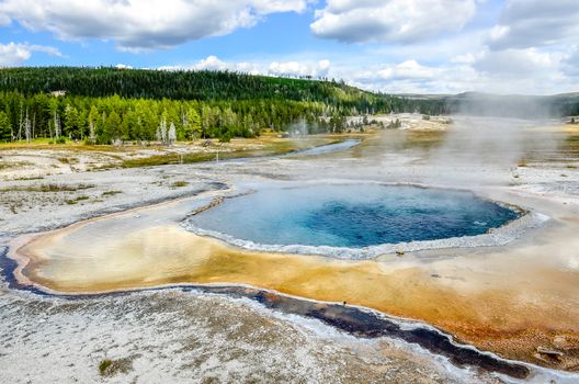 Scenic view of geothermal Crested pool in Yellowstone NP, Wyoming, USA