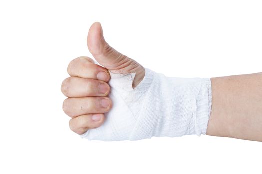 Thumb up showing by hand with white bandages isolated on white background