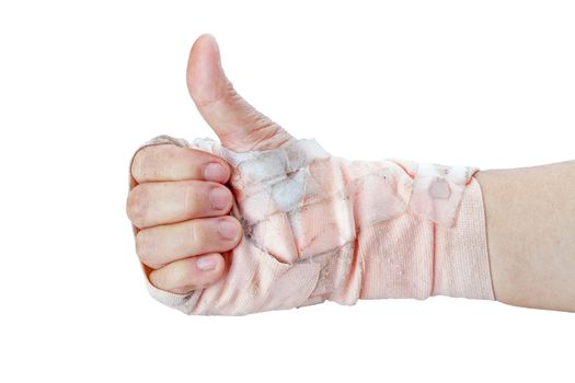 Thumb up showing by hand with bandages isolated on white background