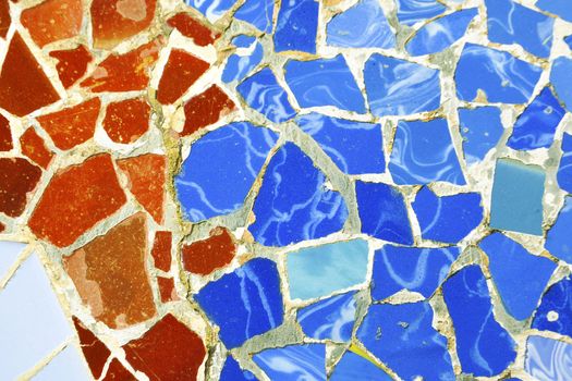 detailed multicolored mosaic ornament fragment from Park Guell, Barcelona, creation of Antonio Gaudi