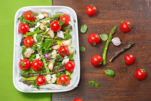 Asparagus and Cherry Tomatoes getting ready for the oven