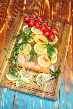 Olive Oil Poached Salmon and herbs, ready to cook