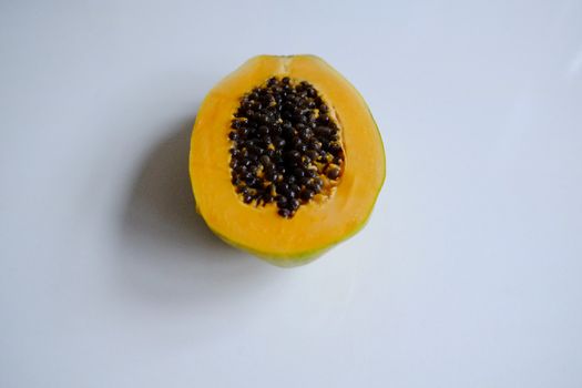 Large papaya cut in half