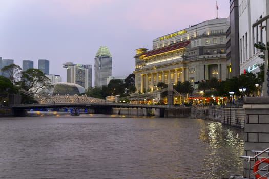 Singapore River and Cavenagh Bridge is the only suspension bridge and one of the oldest bridges in Singapore, 1870 EDITORIAL Singapore 12.02.2014