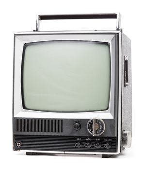 Vintage portable TV set with handle on white background