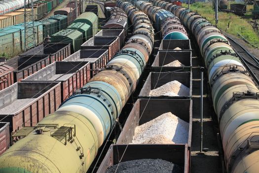 train yard full of freight trains 
