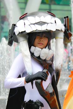 Bangkok - Aug 31: An unidentified Japanese anime cosplay Kubo Wo Kyu pose  on August 31, 2014 at Central World, Bangkok, Thailand.