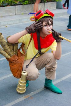 Bangkok - Aug 31: An unidentified Japanese anime cosplay pose  on August 31, 2014 at Central World, Bangkok, Thailand.