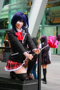 Bangkok - Aug 31: An unidentified Japanese anime cosplay Takanashi Rikka pose  on August 31, 2014 at Central World, Bangkok, Thailand.