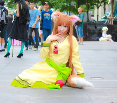 Bangkok - Aug 31: An unidentified Japanese anime cosplay pose  on August 31, 2014 at Central World, Bangkok, Thailand.