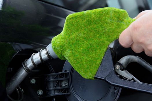 Green fuel nozzle,Fill up the gas tank concept