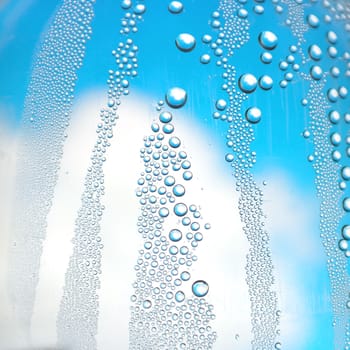 Drops of water on the crooked glass, shallow dof