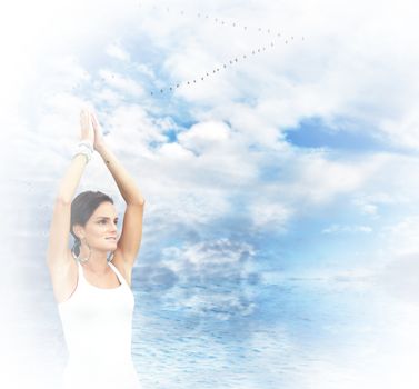 Woman doing yoga outdoor, sky and water, white effect