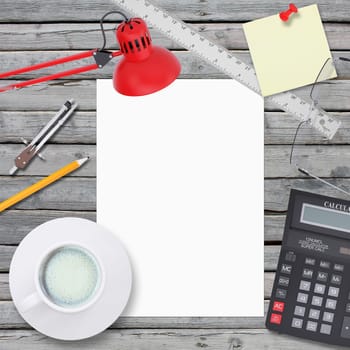 Office desktop. Chancellery, white sheet and lamp. Old wooden board on background