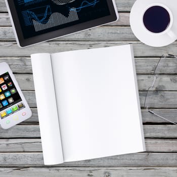 Lie on wooden floor smartphone, tablet and open book. Business concept