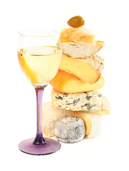 Stack of assorted cheese and white wine isolated on white background