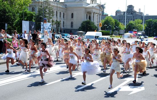 BELGRADE - JUNE 19: A 'Wedding Race' event on The 2nd Belgrade Wedding Fair, organized by a magazine "Wedding " on June 19, 2011 in Belgrade, Serbia.