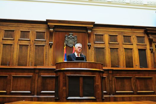 SERBIA, BELGRADE - MAY 31, 2012: President of Serbia Tomislav Nikolich speaks in Serbian Parliament high in the air on his inauguration day