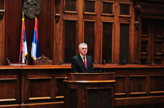 SERBIA, BELGRADE - MAY 31, 2012: President of Serbia Tomislav Nikolich speaks in Serbian Parliament high in the air on his inauguration day
