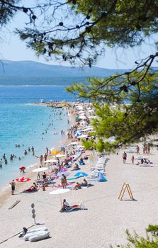 CROATIA, ISLAND BRACH - AUGUST 8, 2011: Zlatni Rat (Golden Cape) is a popular beach in the Town Bol which is on the south of the island of Brac in the Split-Dalmatia County of Croatia