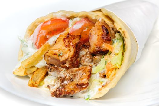 greek gyros stuffed with meat, salad, onion, tomato and potato