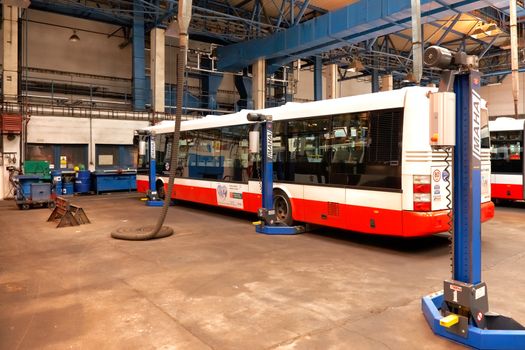 PRAGUE, CZECH REPUBLIC - SEPTEMBER 17: Inspection of chassis of public buses in workshop in Depot Hostivar on Open Doors Day in the Prague Public Transport Company on September 17, 2011 in Prague