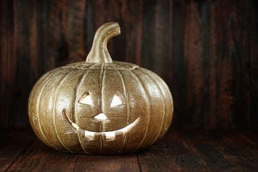 Pumpkin Jack O Lantern on Wood Grunge Rustick Background