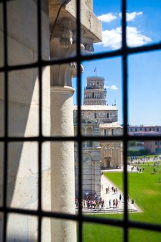 PISA, ITALY - AUGUST 11, 2013: Pisa tower view from Battistero, Piazza del Duomo, Italy