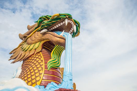 A large dragon statue in the China temple in Thailand.