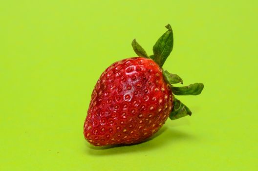 Fresh Ripe Strawberry Fruit on a Colored Background
