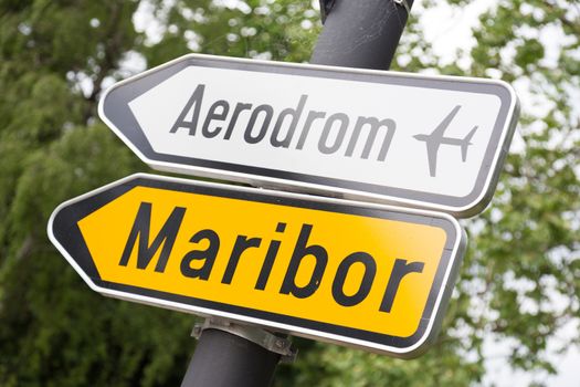 Road sign directing to Maribor and aerport.